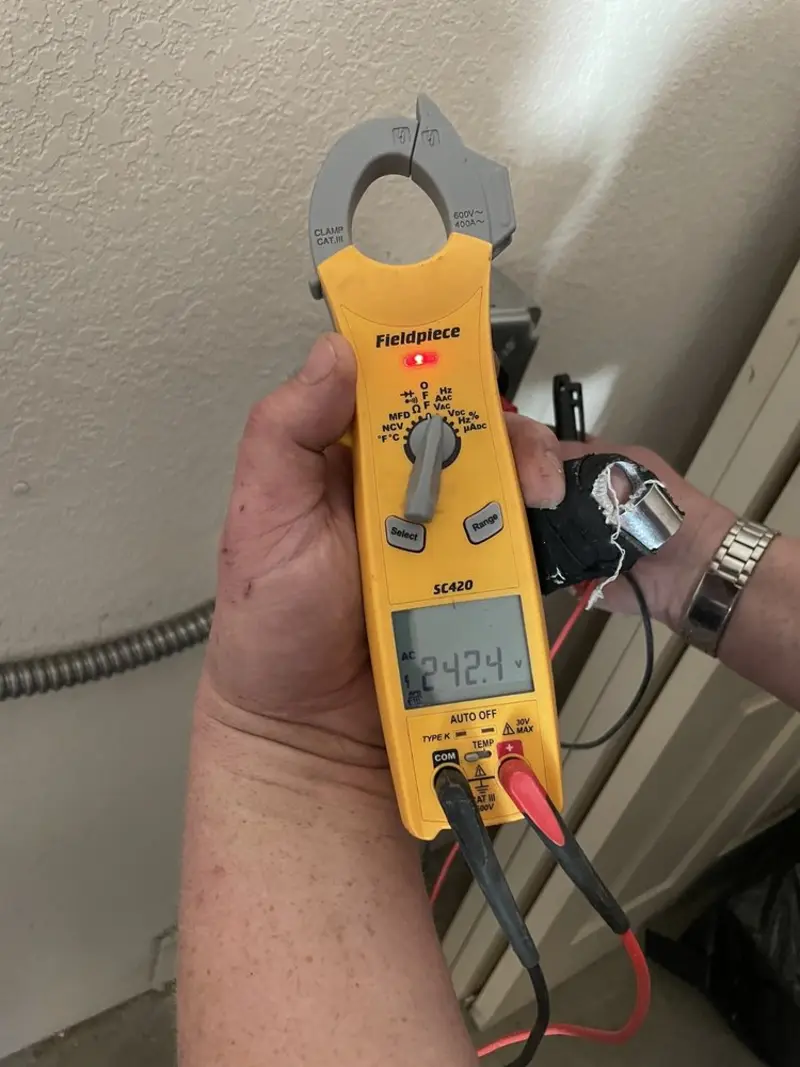 Voltage testing with clamp meter during Aluminum Wiring Replacement in Morrisville